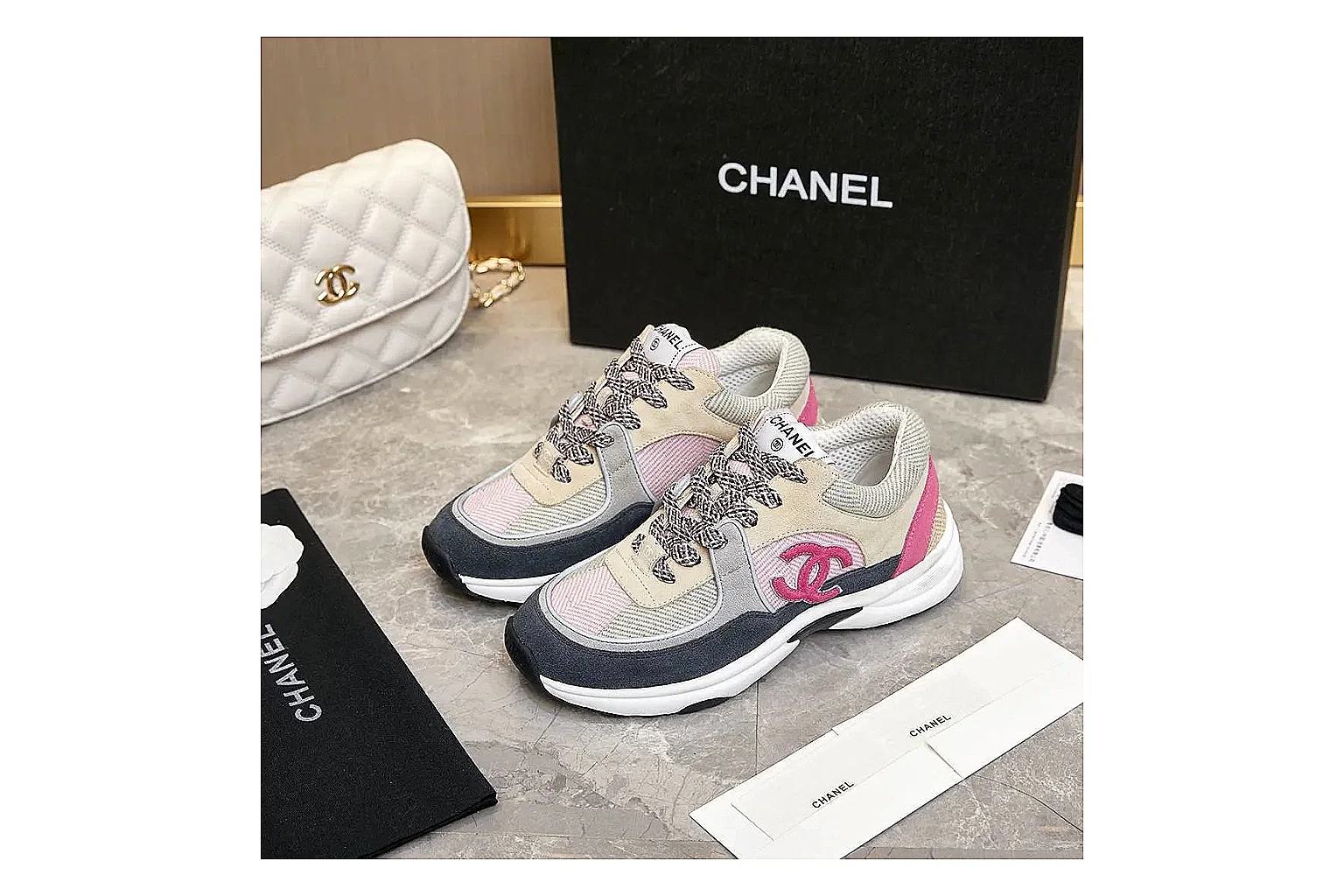 Kako Scout comparison images for Chanel Black White Runner Sneaker
