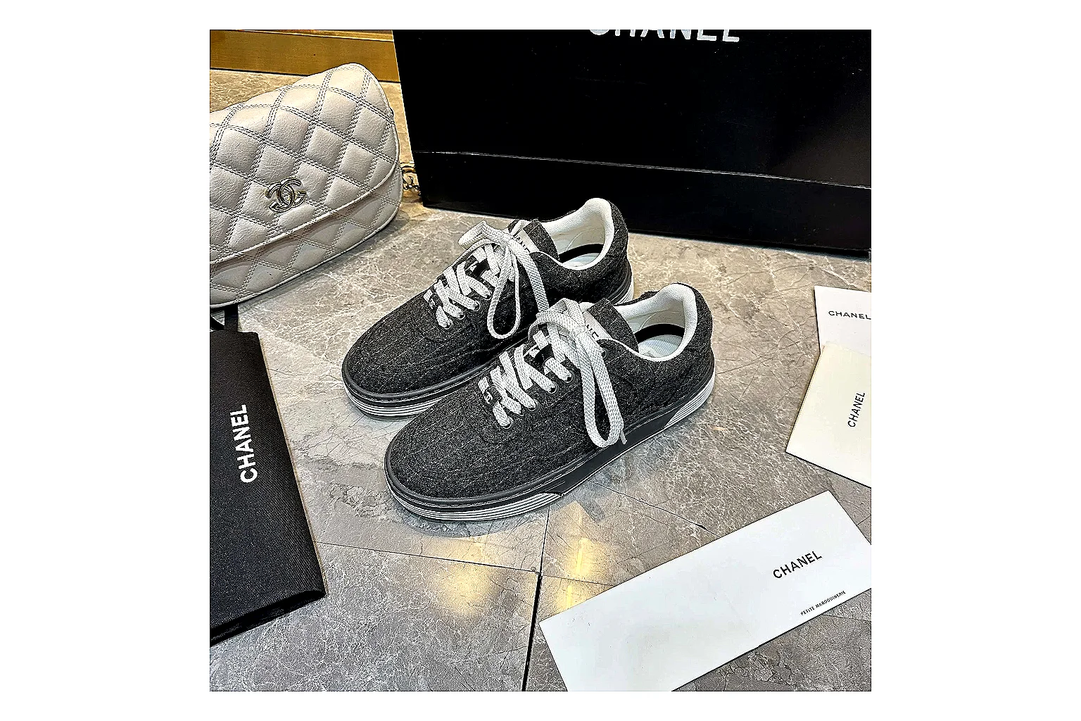 Kako Scout comparison images for Chanel Black White Runner Sneaker