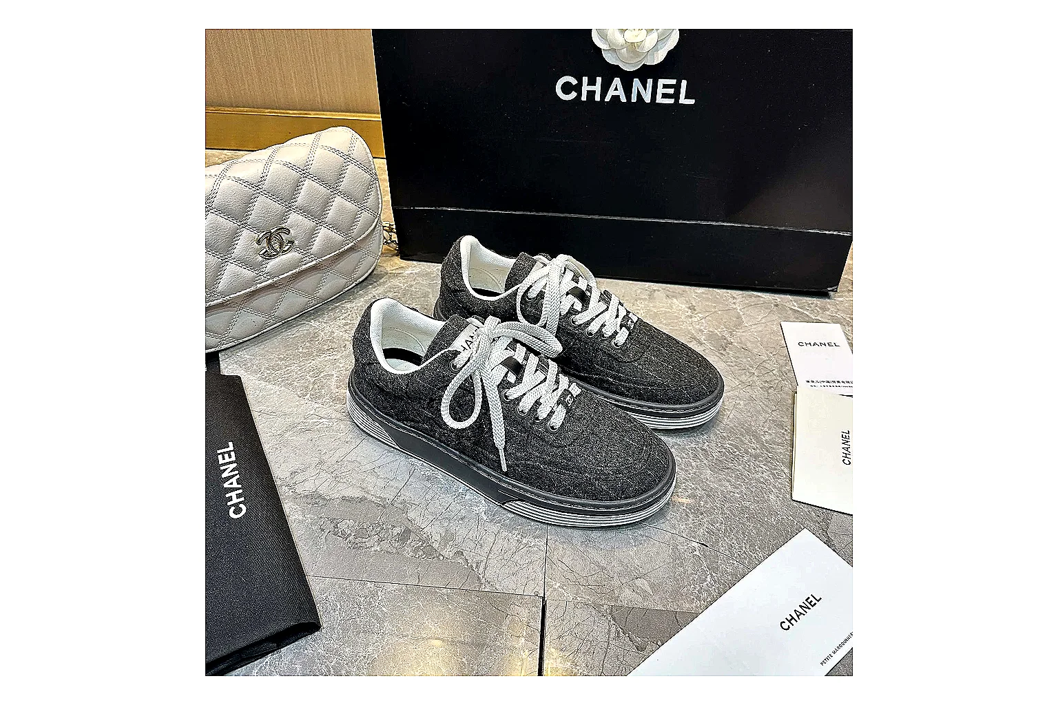 Kako Scout comparison images for Chanel Black White Runner Sneaker thumbnail 6