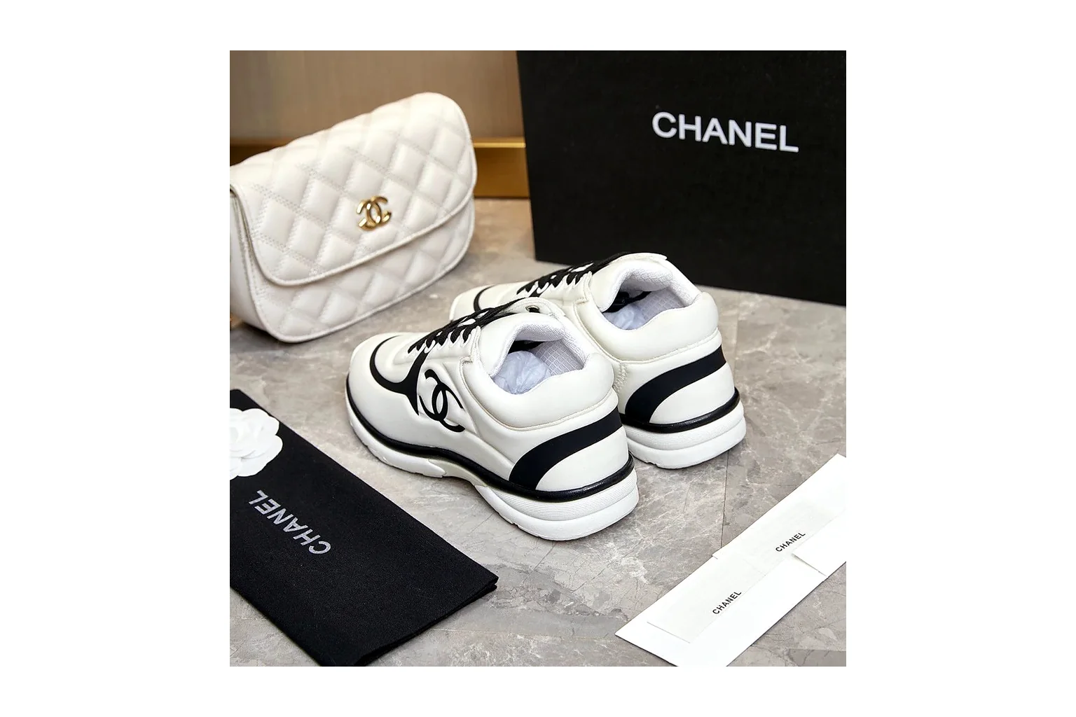 Chanel CC Low Top White Black luxury low top six photo view thumbnail 3