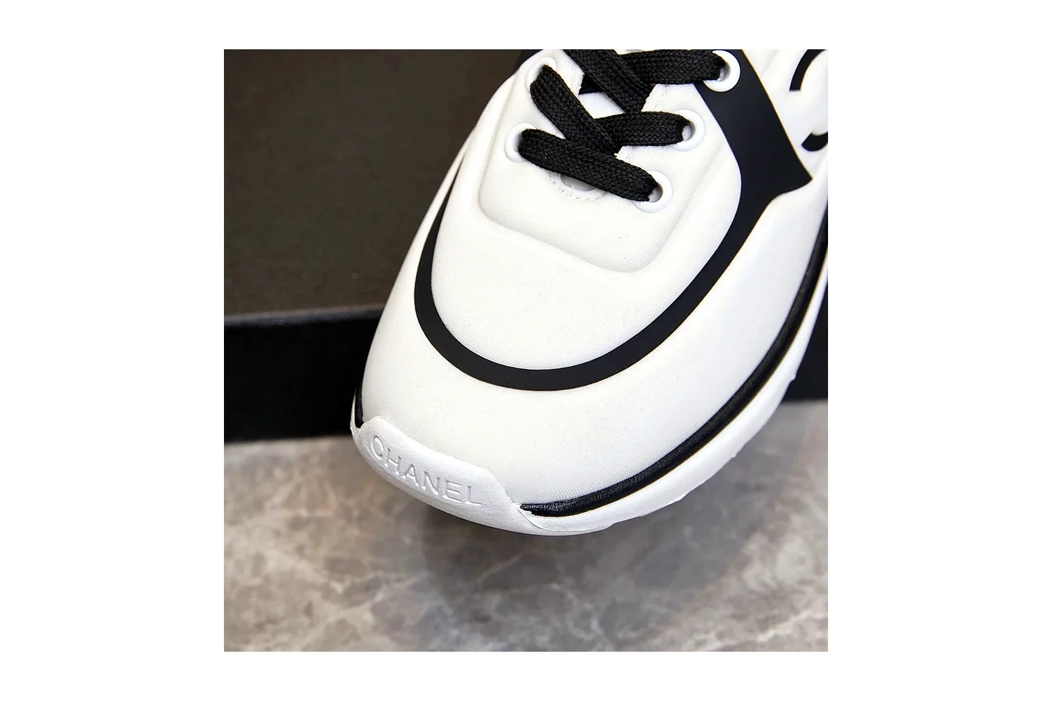 Chanel CC Low Top White Black luxury low top six photo view thumbnail 4
