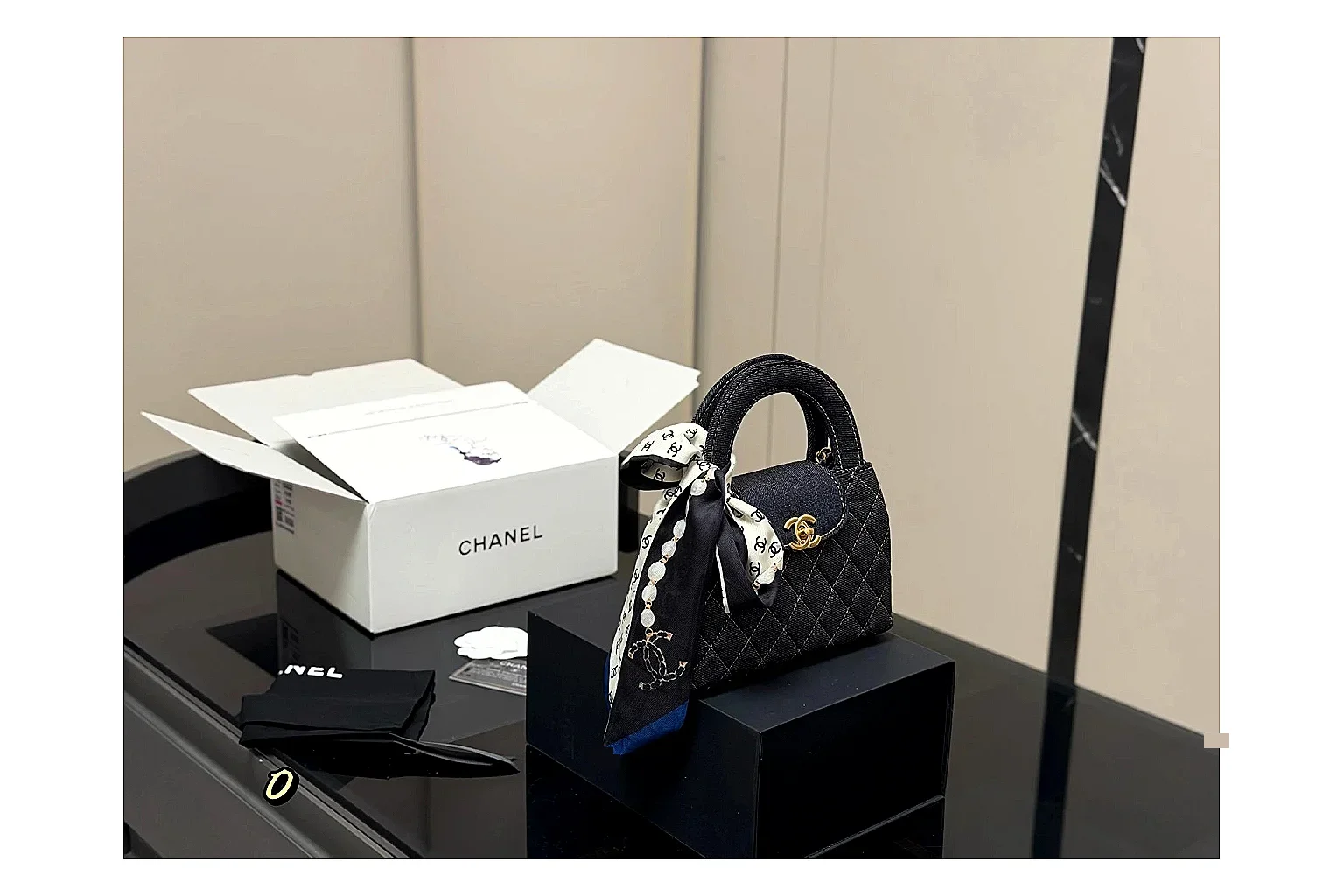 Chanel Quilted Chain Bag Black comparison photo showing black quilted leather body, chain strap, flap profile, and polished luxury hardware