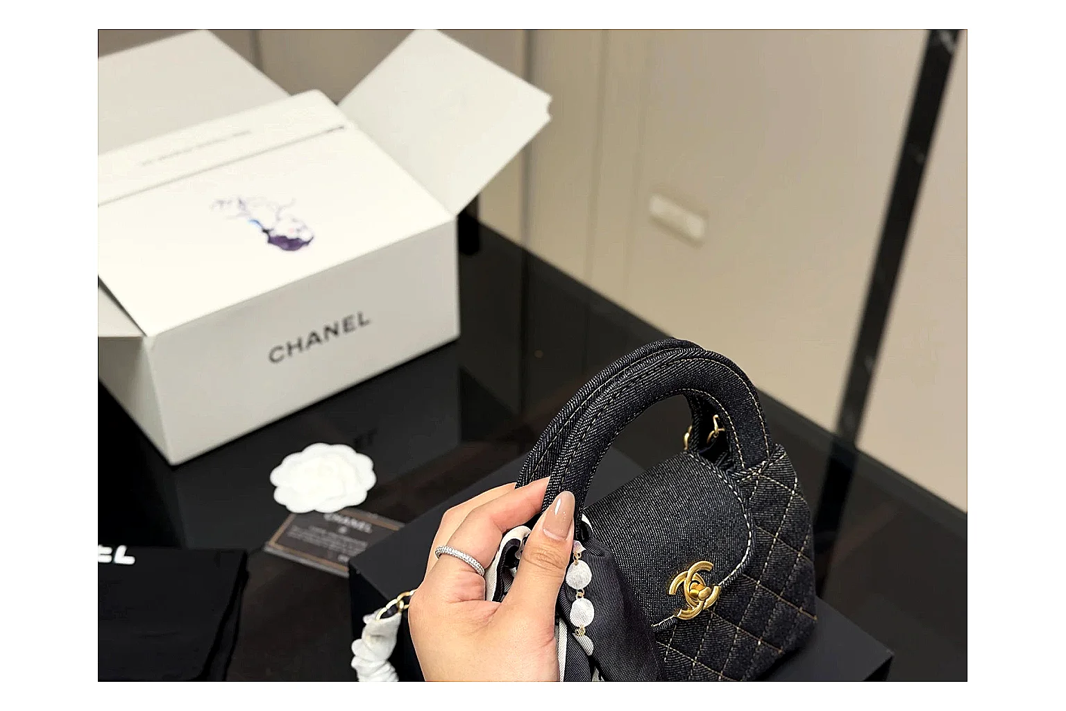 Chanel Quilted Chain Bag Black comparison photo showing black quilted leather body, chain strap, flap profile, and polished luxury hardware thumbnail 2