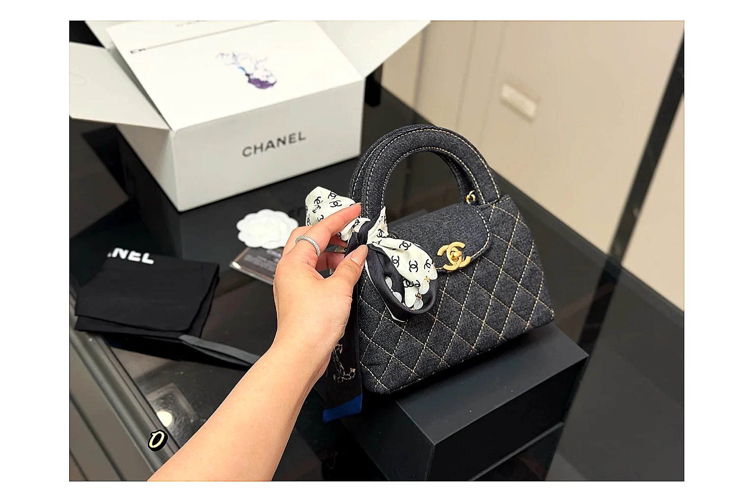 Chanel Quilted Chain Bag Black comparison photo showing black quilted leather body, chain strap, flap profile, and polished luxury hardware thumbnail 6