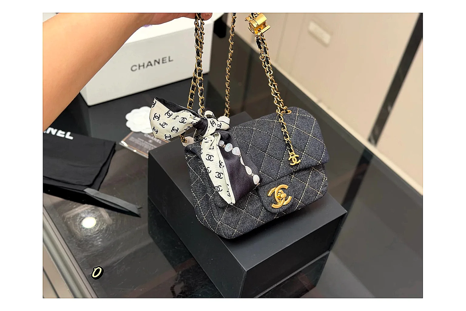 Chanel Quilted Chain Bag Black comparison photo showing black quilted leather body, chain shoulder strap, flap structure, and polished hardware thumbnail 6