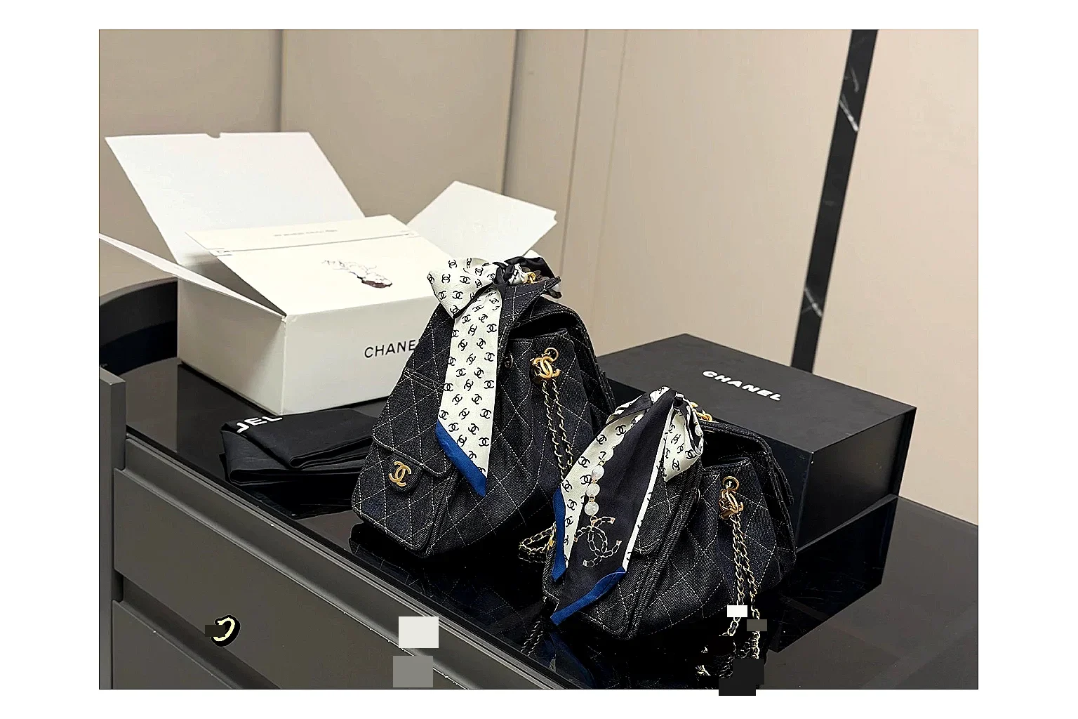 Chanel Quilted Chain Bag Black Blue comparison photo showing black blue quilted leather body, chain shoulder strap, flap structure, and polished luxury-bag hardware