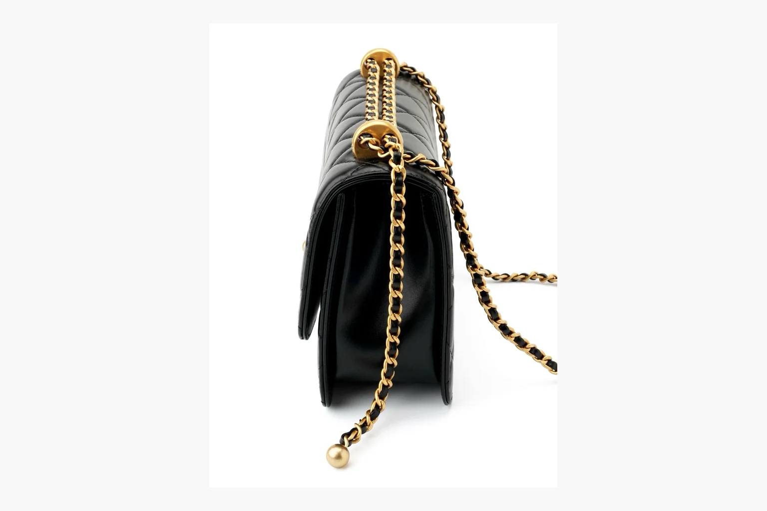 Chanel Black Quilted Chain Flap Bag comparison photo showing black quilted leather flap body, gold chain strap, CC front logo, rectangular shoulder-bag shape, and polished hardware thumbnail 3