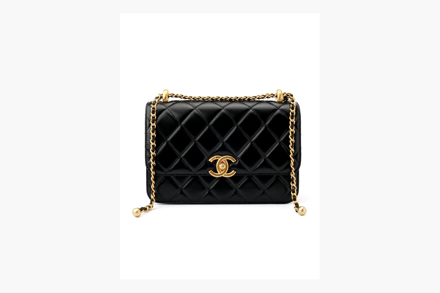 Chanel Black Quilted Chain Flap Bag comparison photo showing black quilted leather flap body, gold chain strap, CC front logo, rectangular shoulder-bag shape, and polished hardware thumbnail 4