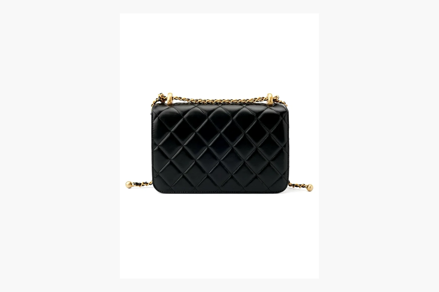 Chanel Black Quilted Chain Flap Bag comparison photo showing black quilted leather flap body, gold chain strap, CC front logo, rectangular shoulder-bag shape, and polished hardware thumbnail 5