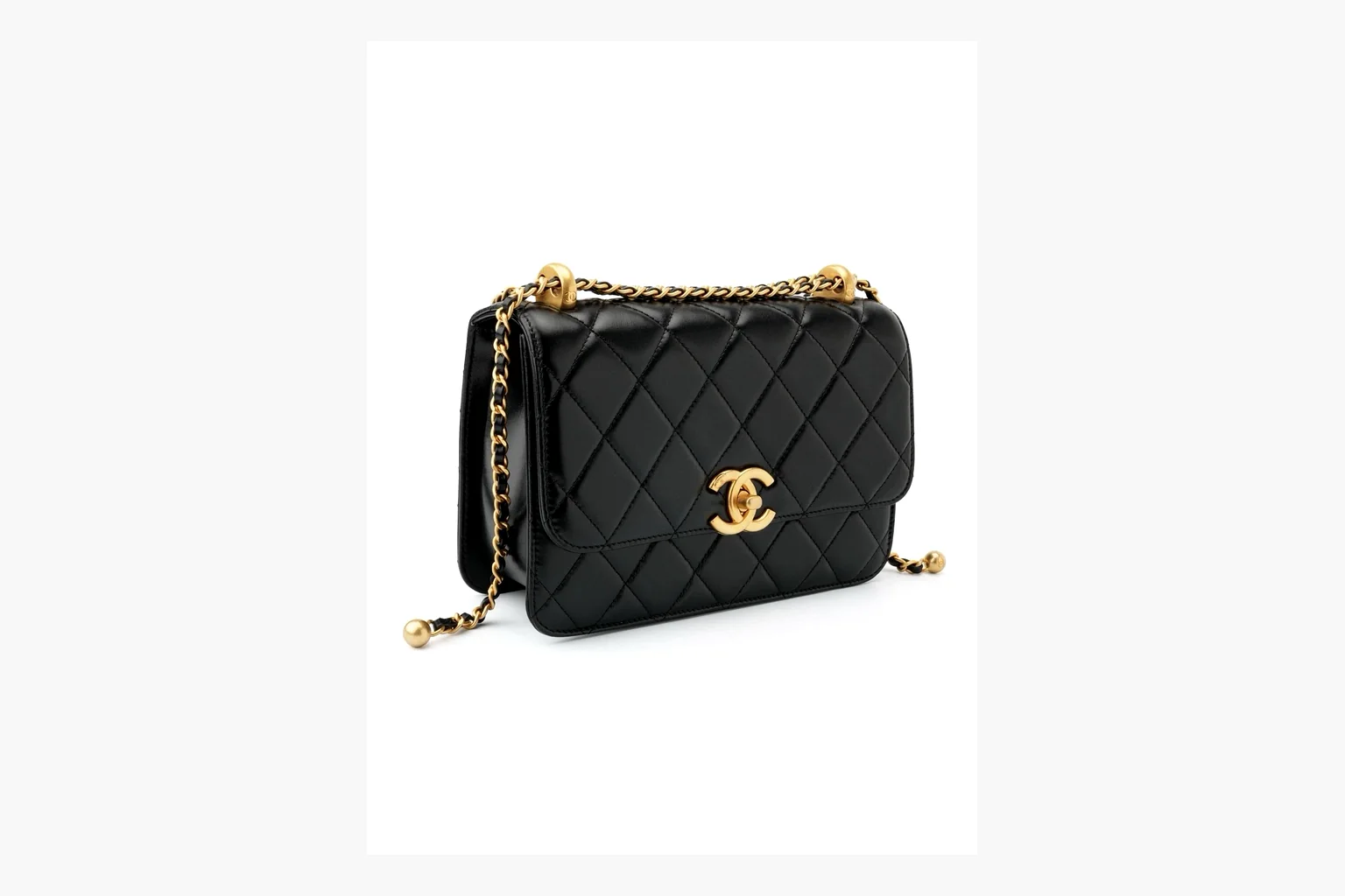 Chanel Black Quilted Chain Flap Bag comparison photo showing black quilted leather flap body, gold chain strap, CC front logo, rectangular shoulder-bag shape, and polished hardware thumbnail 6