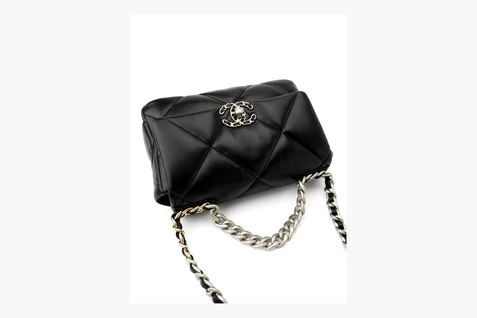 Chanel Quilted Chain Flap Bag Black comparison photo showing black quilted leather flap body, gold chain strap, CC turnlock, and classic shoulder-bag structure thumbnail 4