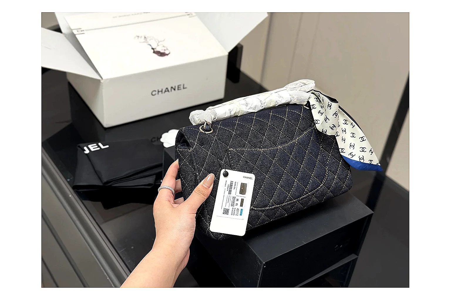 Chanel Quilted Flap Bag Black Navy comparison photo showing black navy quilted leather body, flap structure, chain strap, and polished luxury hardware thumbnail 3