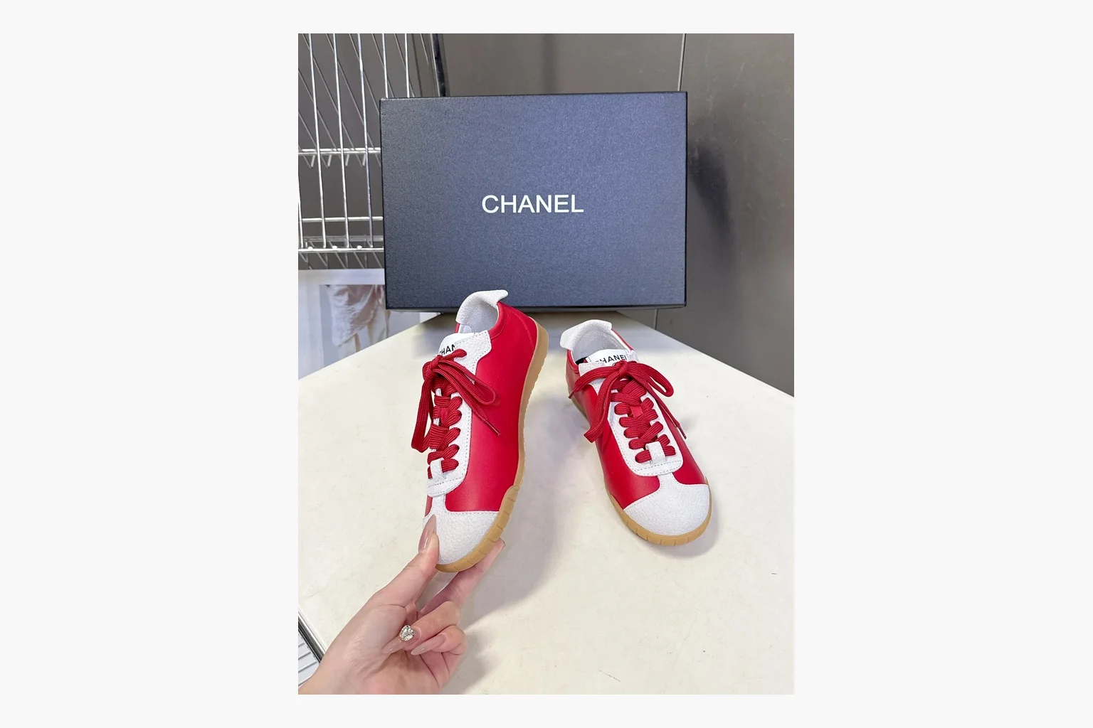 Chanel Red White Platform Sneaker comparison photo showing red and white low-top upper, platform sole, leather-suede panel mix, box views, and rounded casual sneaker shape