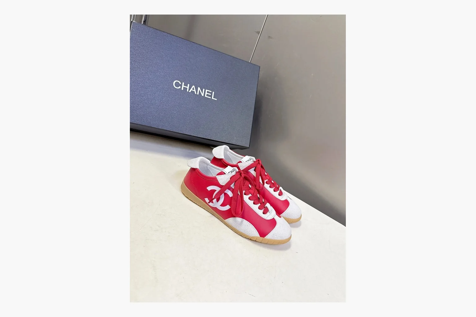 Chanel Red White Platform Sneaker comparison photo showing red and white low-top upper, platform sole, leather-suede panel mix, box views, and rounded casual sneaker shape thumbnail 6