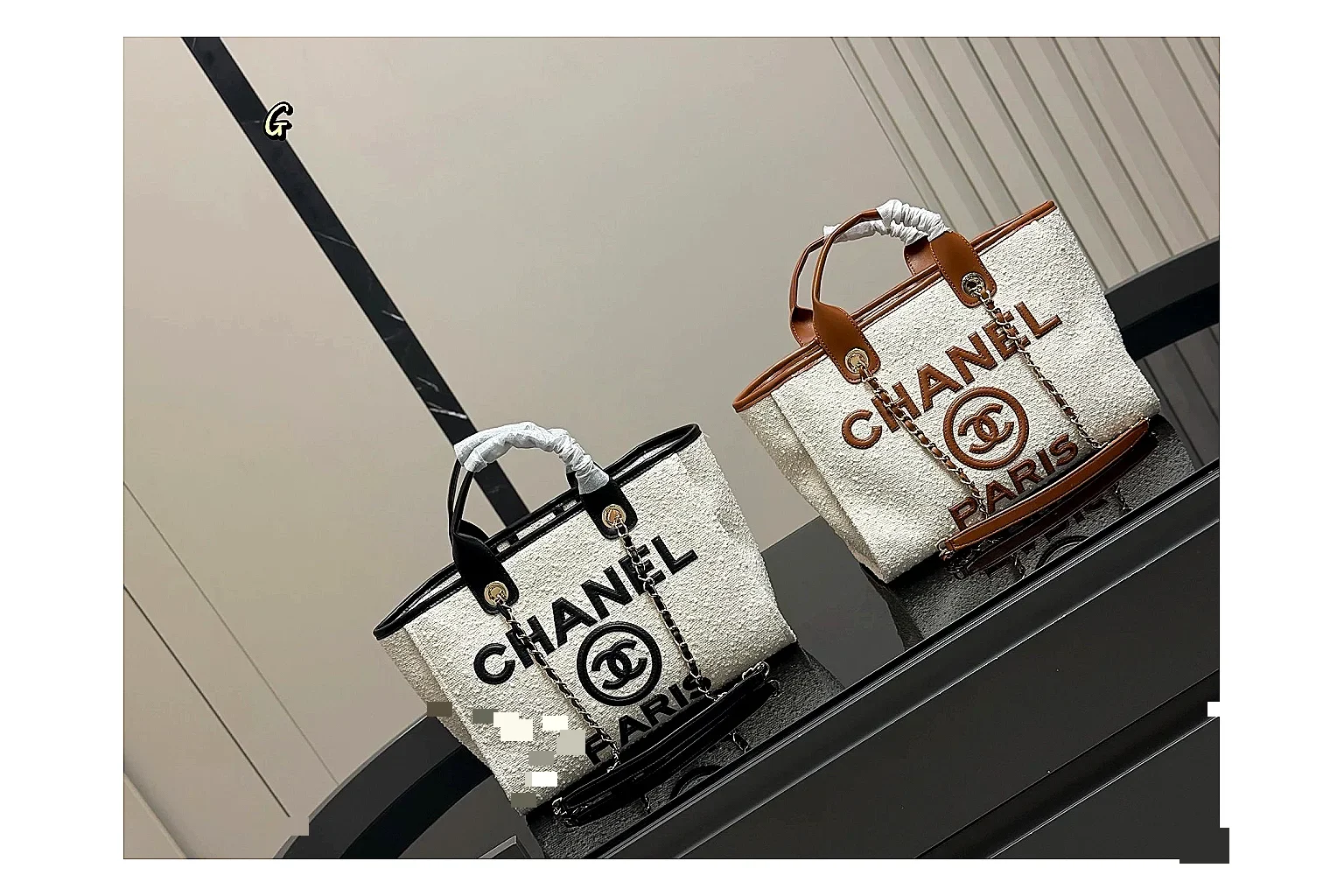 Chanel Tote Bag White Black comparison photo showing white black canvas-leather tote body, open carry shape, structured handles, and branded luxury-bag details
