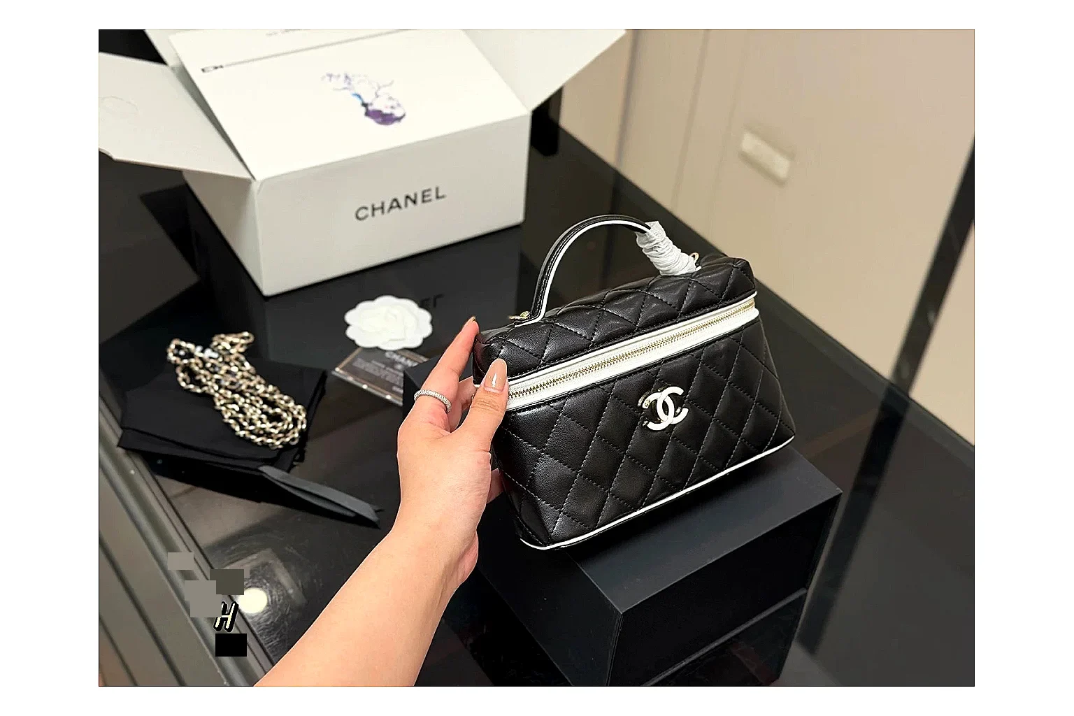 Chanel Wallet On Chain Black comparison photo showing black quilted leather wallet body, chain strap, flap closure, and compact shoulder-bag profile