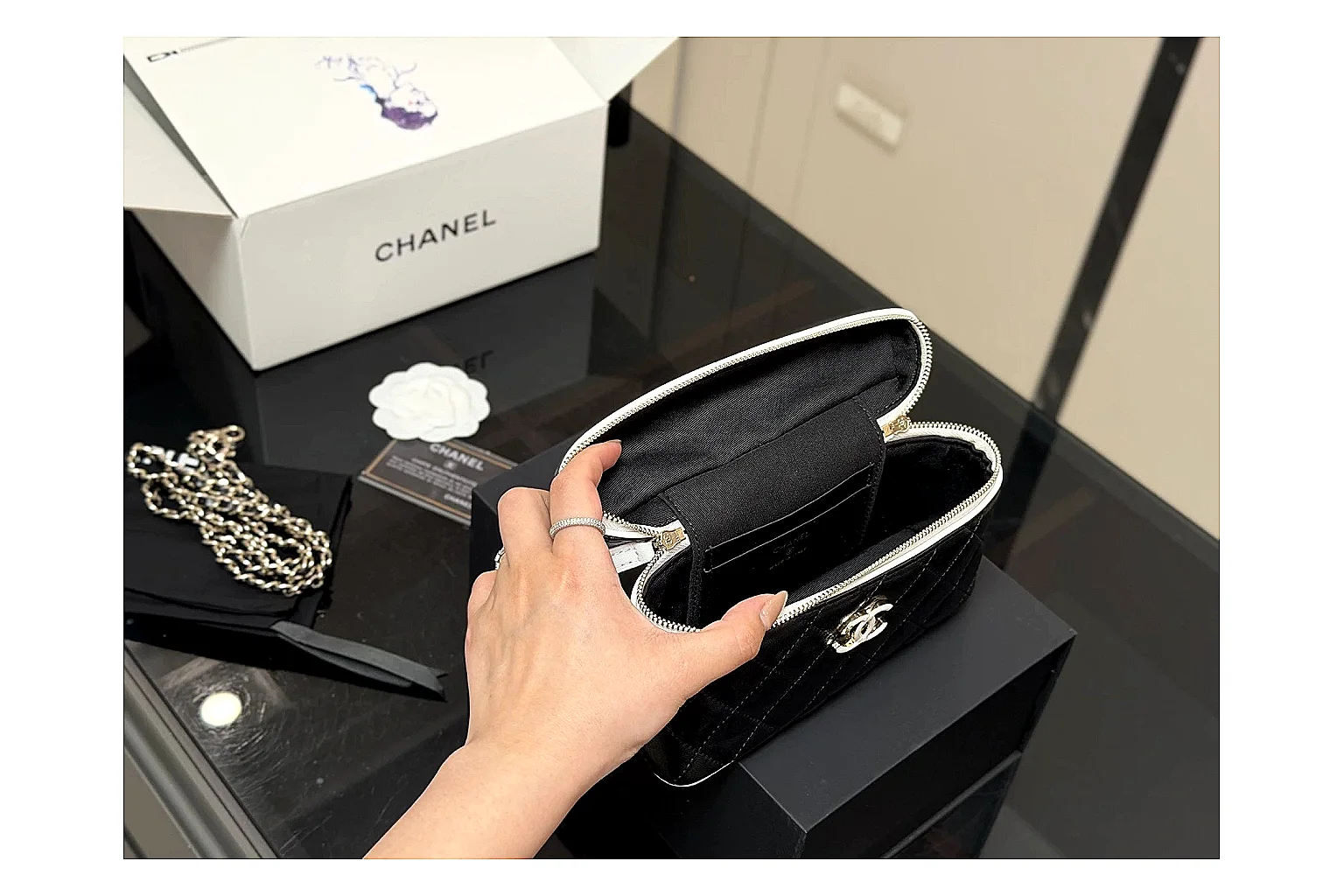 Chanel Wallet On Chain Black comparison photo showing black quilted leather wallet body, chain strap, flap closure, and compact shoulder-bag profile thumbnail 4