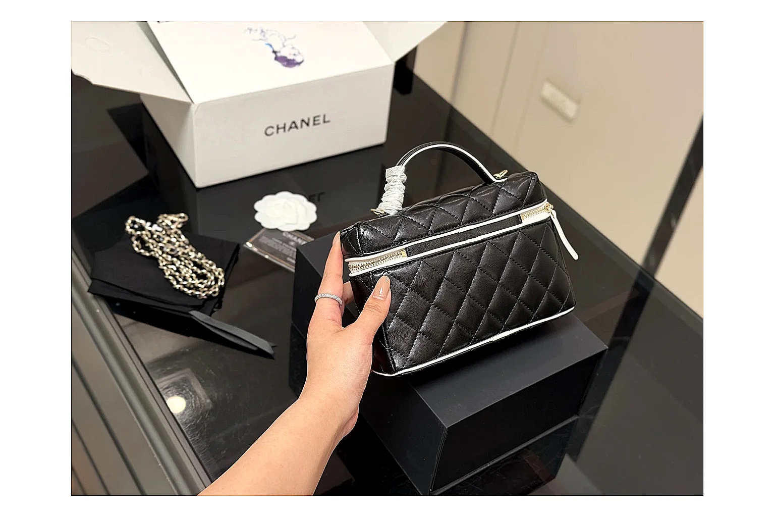Chanel Wallet On Chain Black comparison photo showing black quilted leather wallet body, chain strap, flap closure, and compact shoulder-bag profile thumbnail 5