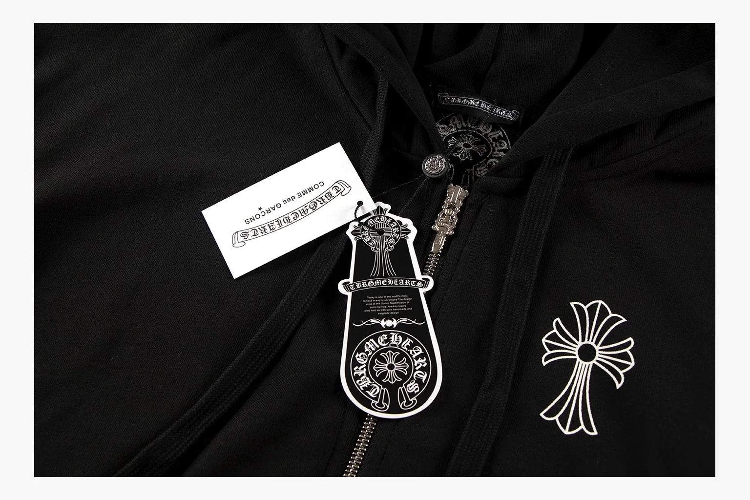 Chrome Hearts Cross Zip Hoodie Black comparison photo showing black cotton fleece zip hoodie, large back cross graphic, silver zipper pull, hood drawcords, and front pocket structure thumbnail 4