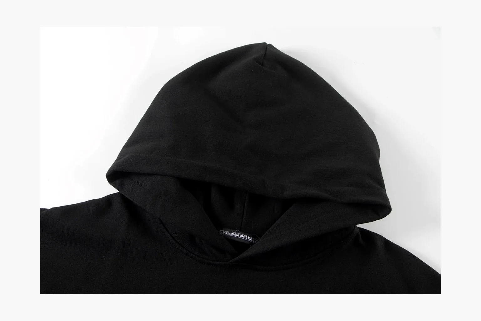 Chrome Hearts Rainbow Logo Hoodie Black comparison photo showing black cotton fleece pullover body, colorful back logo, hood detail, sleeve print, kangaroo pocket, and ribbed trim