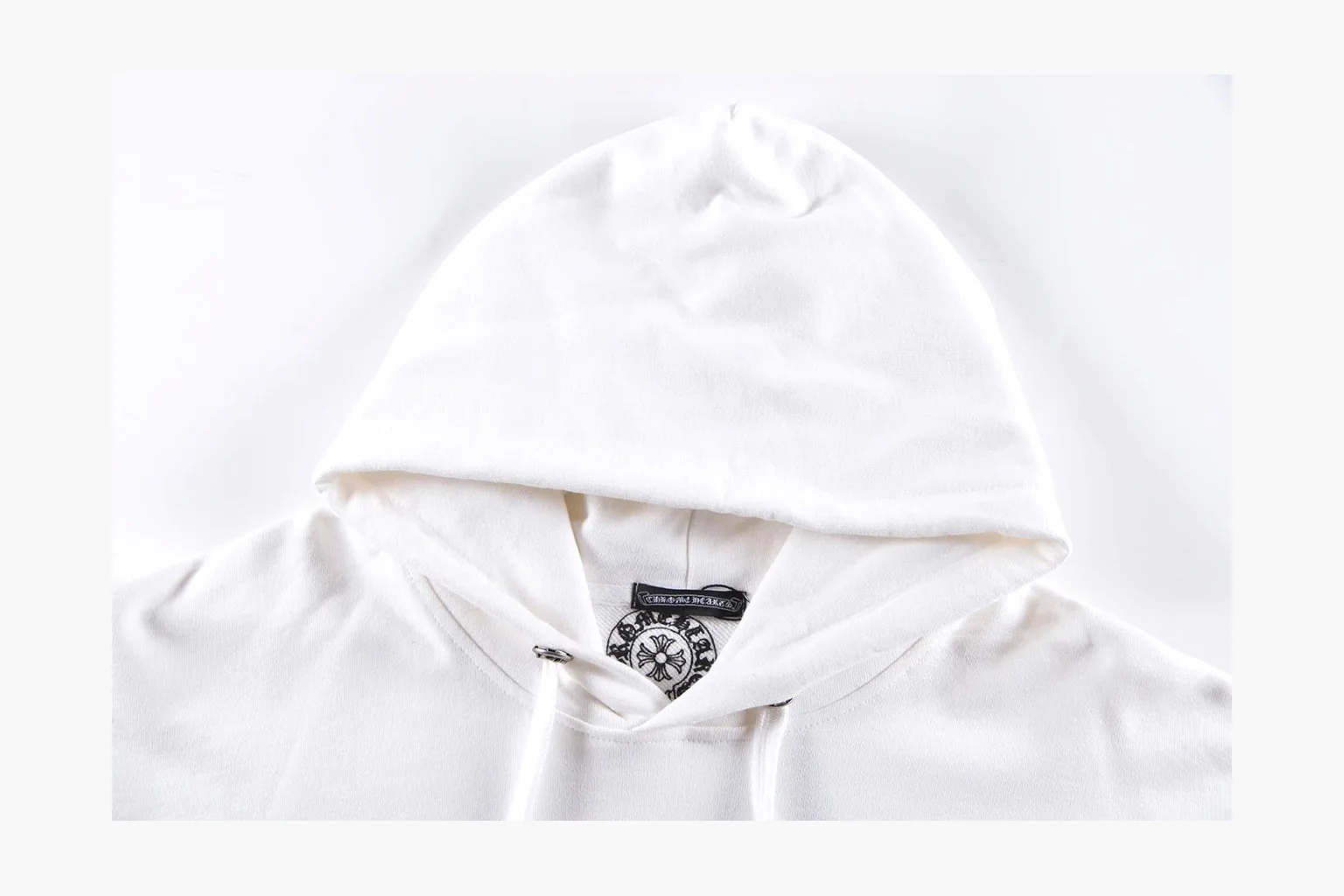 Chrome Hearts White Cross Zip Hoodie comparison photo showing white cotton fleece zip hoodie, cross back artwork, drawcord hood, sleeve print, front zipper, and ribbed trim thumbnail 4
