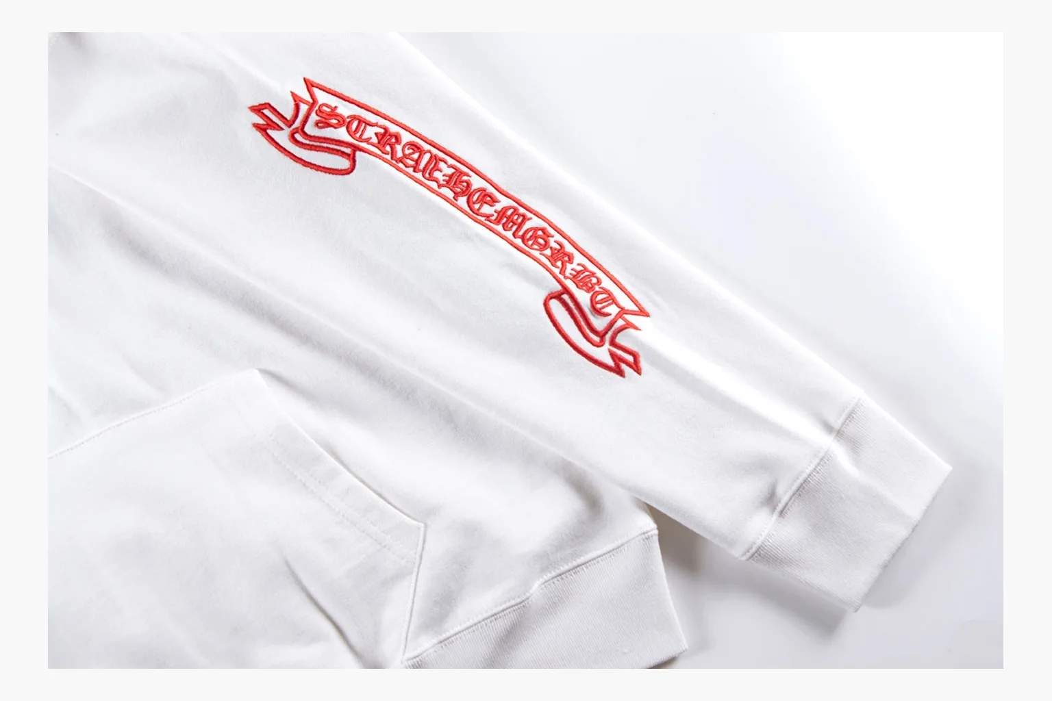 Chrome Hearts White Cross Zip Hoodie comparison photo showing white cotton fleece zip hoodie, cross back artwork, drawcord hood, sleeve print, front zipper, and ribbed trim thumbnail 5