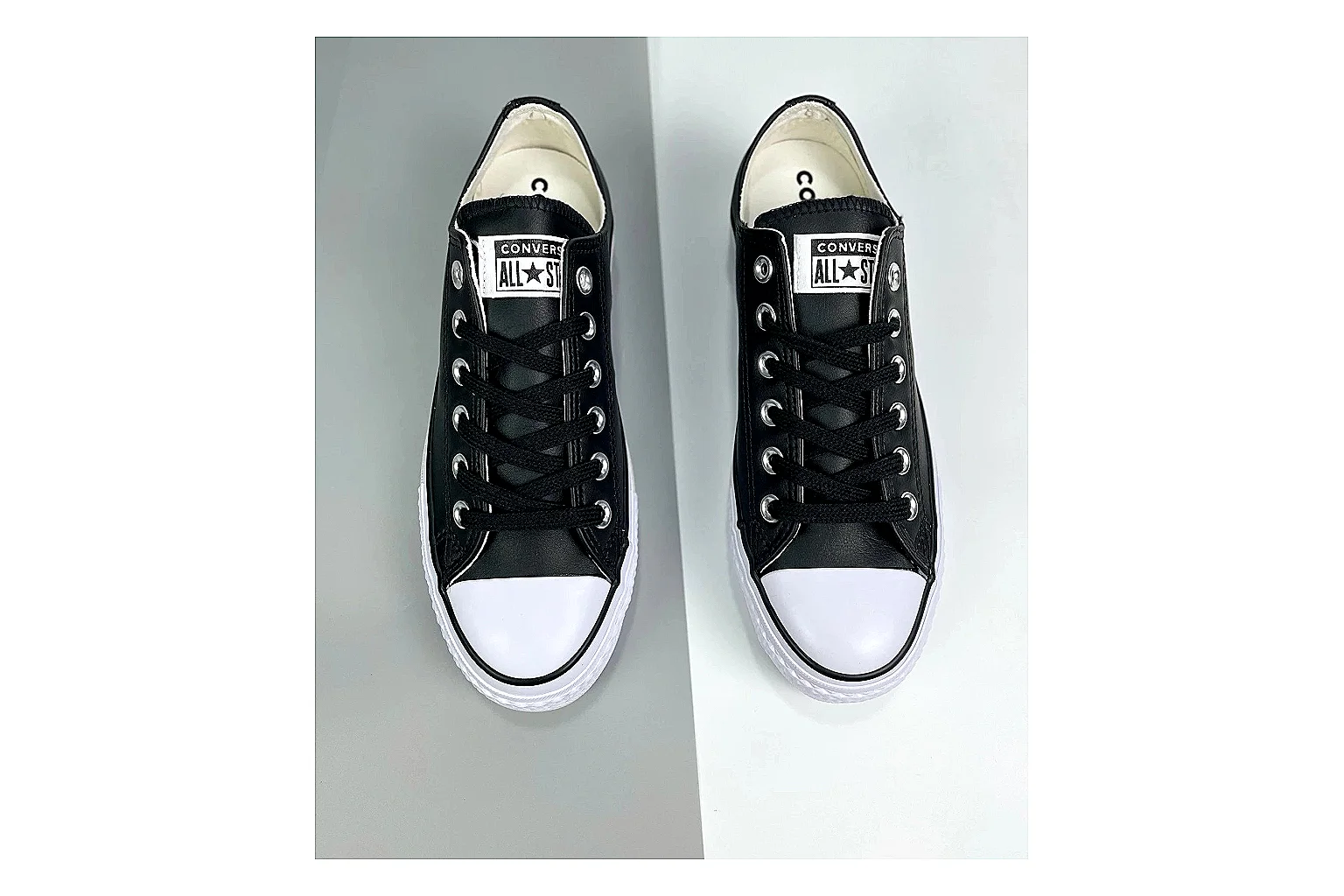 Converse All Star Lift Black Platform Low Top comparison photo showing black leather low-top upper, silver eyelets, white rubber toe cap, and elevated striped platform sole