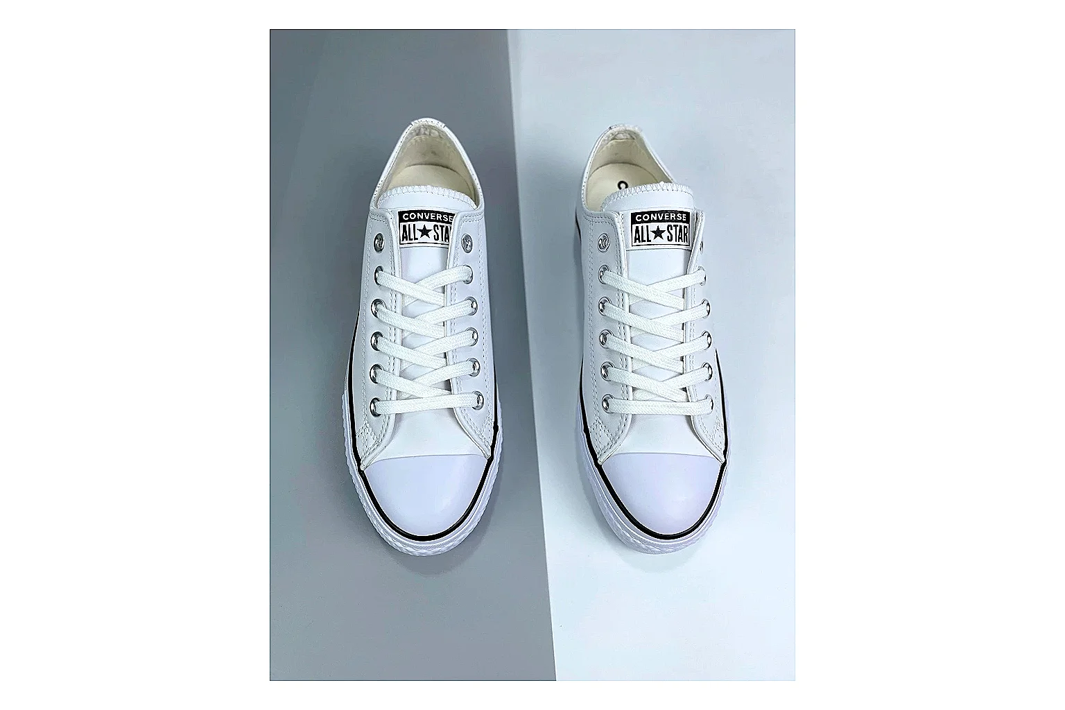 Converse All Star Lift White Platform Low Top comparison photo showing white smooth low-top upper, silver eyelets, black foxing stripes, and elevated platform rubber sole thumbnail 2