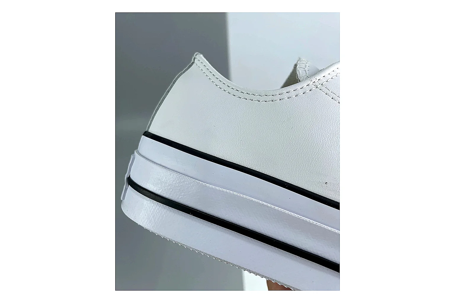 Converse All Star Lift White Platform Low Top comparison photo showing white smooth low-top upper, silver eyelets, black foxing stripes, and elevated platform rubber sole thumbnail 5