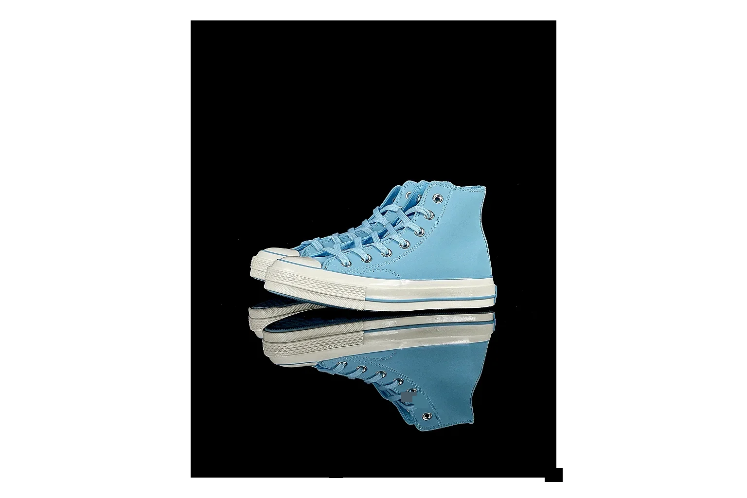 Converse Chuck 70 Light Blue High Top comparison photo showing light blue canvas upper, silver eyelets, off-white rubber toe cap, and vintage high-top sole