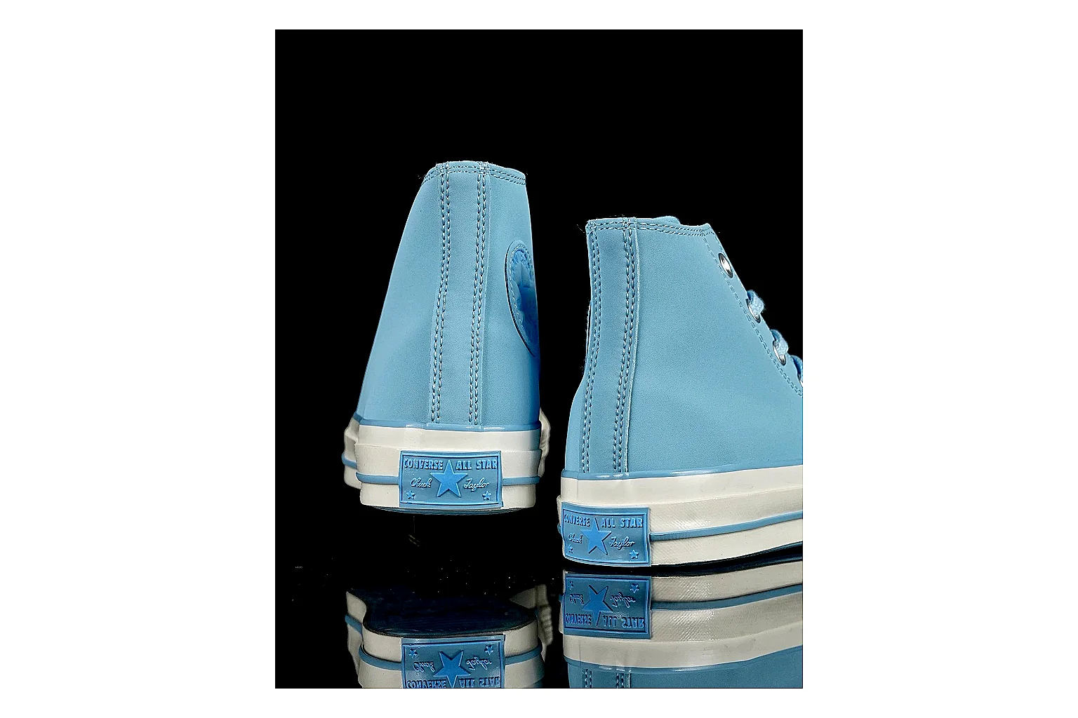 Converse Chuck 70 Light Blue High Top comparison photo showing light blue canvas upper, silver eyelets, off-white rubber toe cap, and vintage high-top sole thumbnail 3