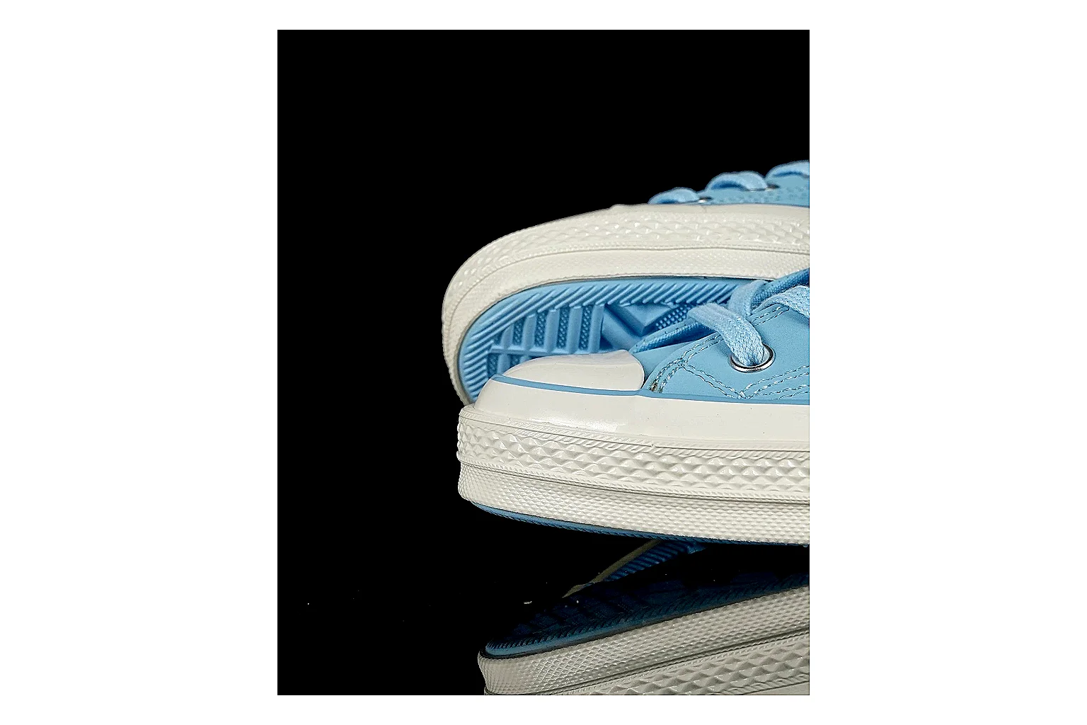 Converse Chuck 70 Light Blue High Top comparison photo showing light blue canvas upper, silver eyelets, off-white rubber toe cap, and vintage high-top sole thumbnail 4