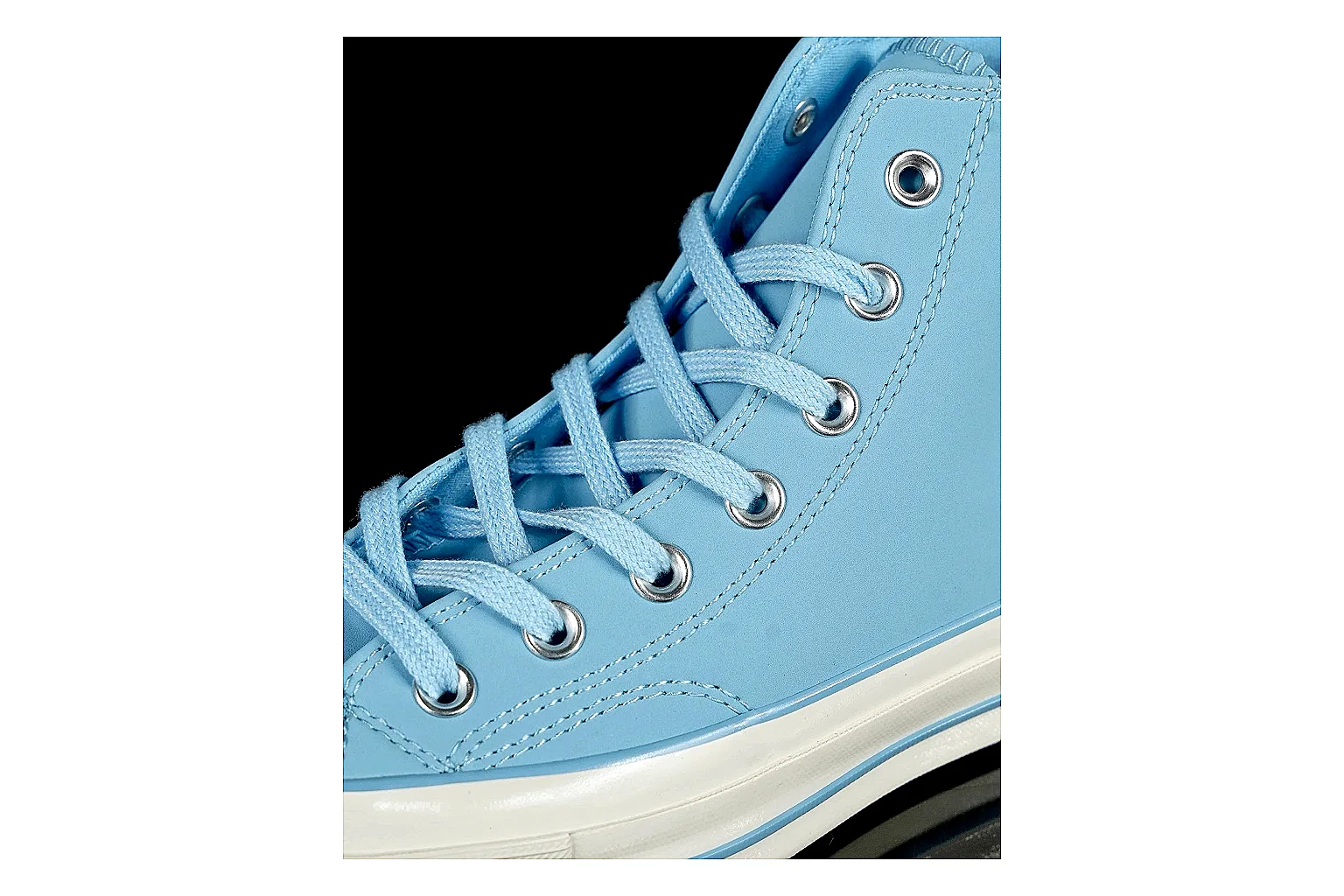 Converse Chuck 70 Light Blue High Top comparison photo showing light blue canvas upper, silver eyelets, off-white rubber toe cap, and vintage high-top sole thumbnail 5