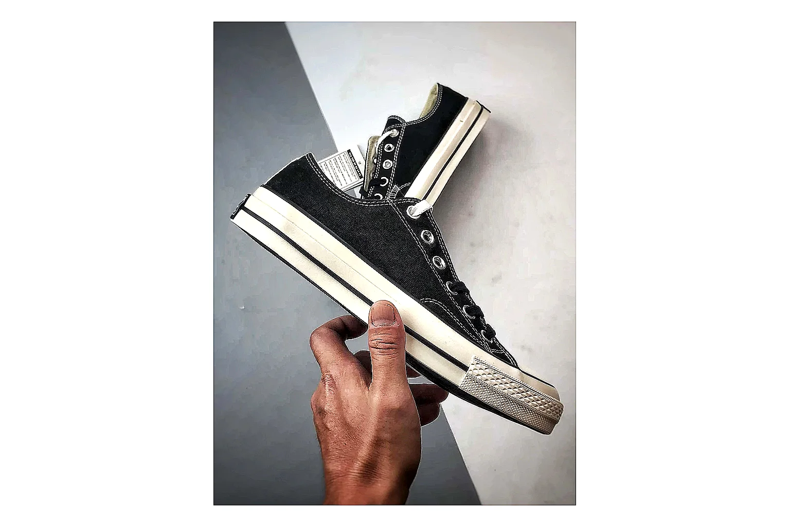 Converse Chuck Low Black White comparison photo showing black canvas low-top upper, white rubber toe cap, metal eyelets, and classic Converse sole thumbnail 4