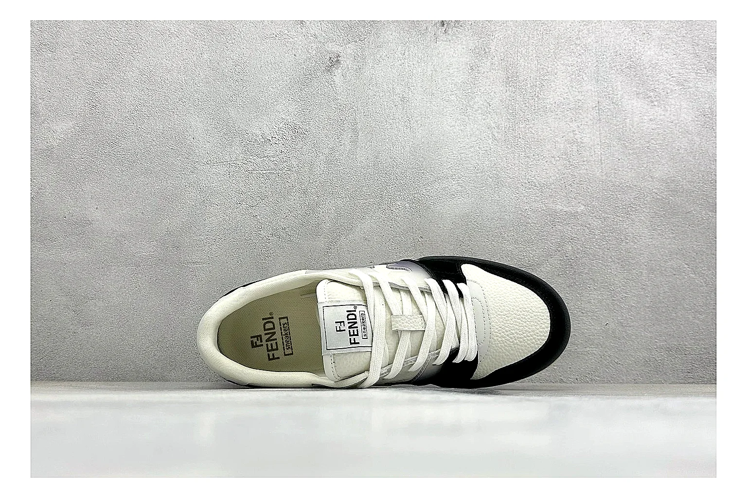 Fendi Match Black White comparison photo showing black and white low-top upper, chunky sole, clean panel blocking, and casual designer profile