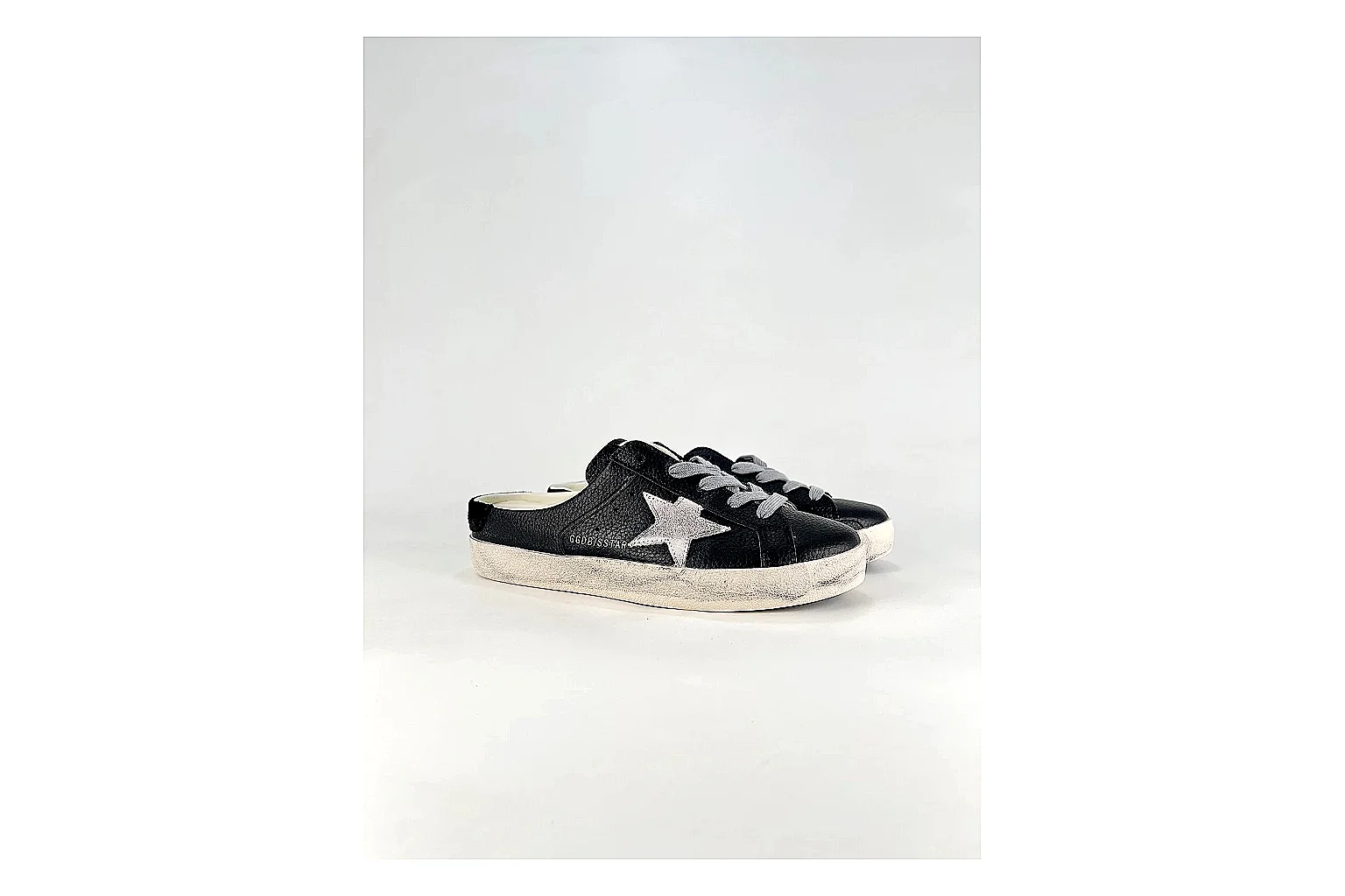 GGDB Super-Star Black White Sneakers comparison signal photo with black white distressed low-top sneakers with leather texture, side-profile shape, upper panel lines, and outsole detail thumbnail 2