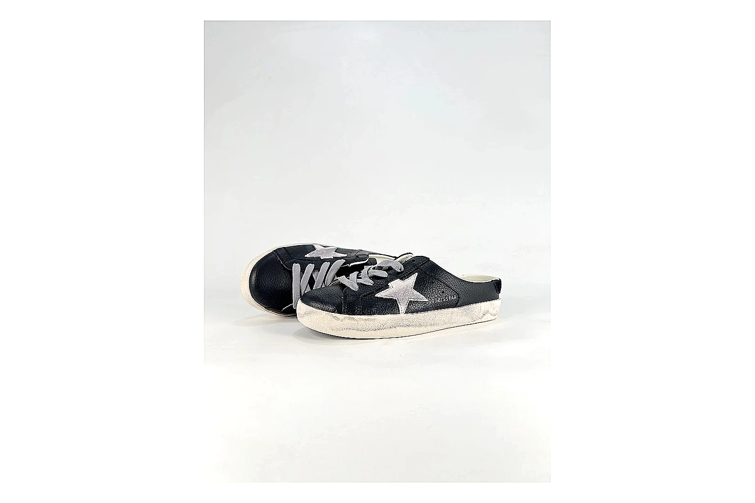 GGDB Super-Star Black White Sneakers comparison signal photo with black white distressed low-top sneakers with leather texture, side-profile shape, upper panel lines, and outsole detail thumbnail 6