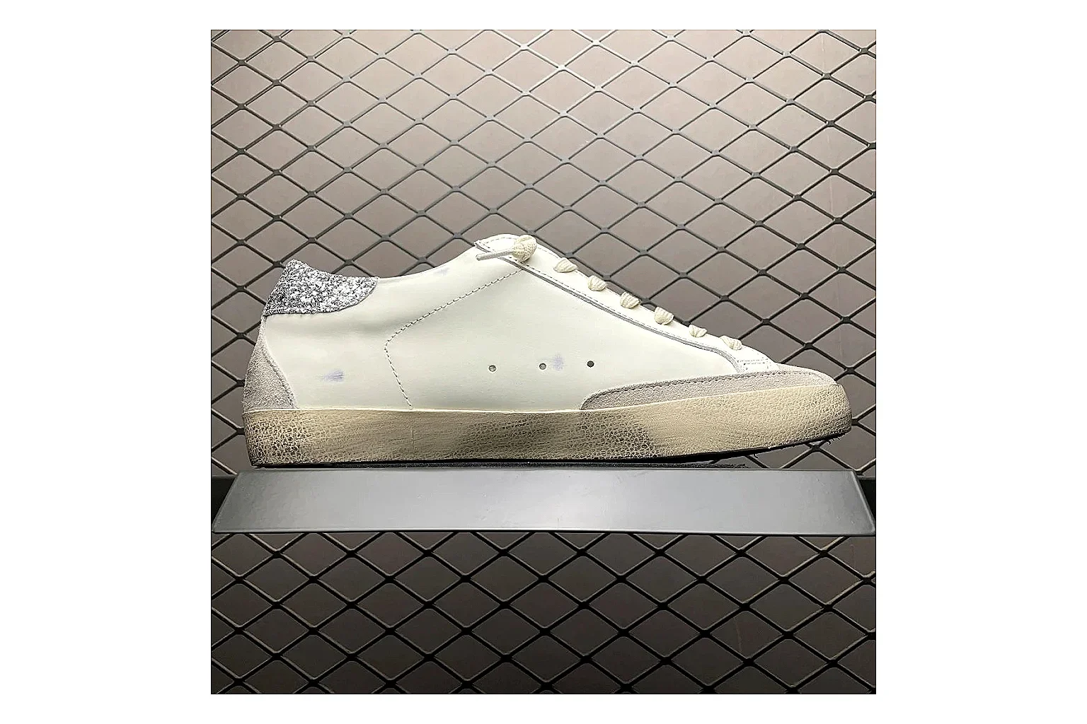 Golden Goose Super-Star White Silver comparison signal photo with white silver gold super-star distressed low-top with mixed upper and low top shape