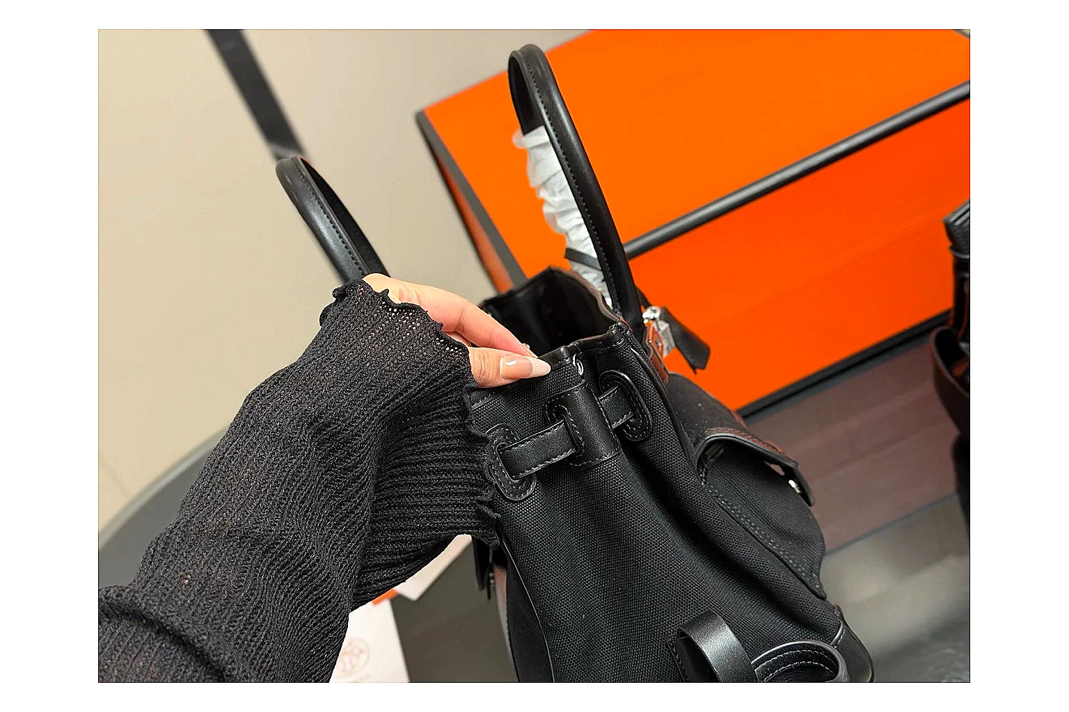 Hermes Birkin Style Black comparison photo showing black leather structured body, top handles, flap-and-strap shape, and polished hardware thumbnail 3