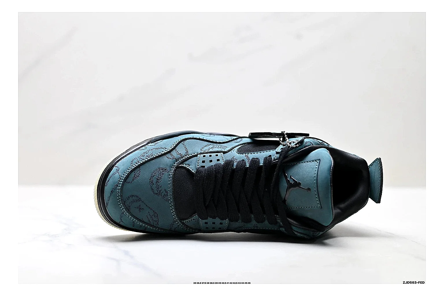 Jordan Air Jordan 4 Teal Black Sneakers comparison signal photo with teal black retro basketball sneakers with nubuck texture, side-profile shape, upper panel lines, and outsole detail