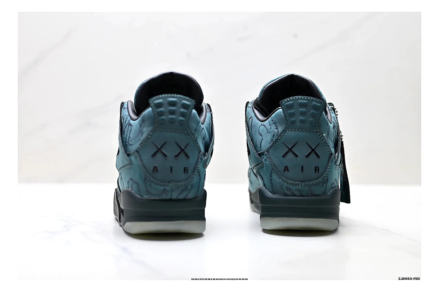 Jordan Air Jordan 4 Teal Black Sneakers comparison signal photo with teal black retro basketball sneakers with nubuck texture, side-profile shape, upper panel lines, and outsole detail thumbnail 3