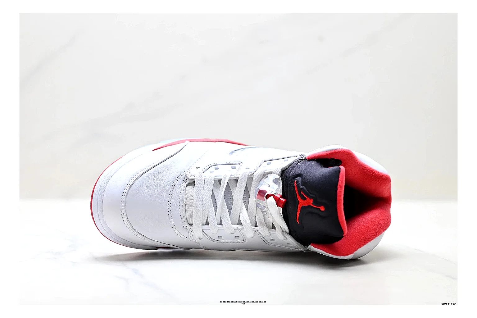 Jordan Air Jordan 5 White Red Sneakers comparison signal photo with white red retro basketball sneakers with leather texture, side-profile shape, upper panel lines, and outsole detail