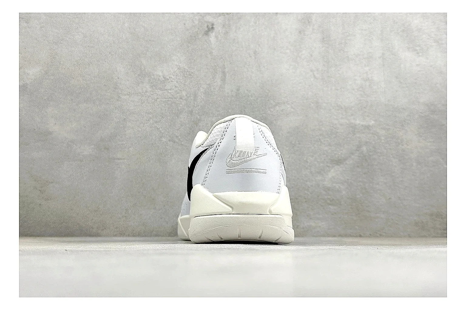 Jordan CMFT White Black comparison photo showing white and black layered court panels, red logo detail, low collar, and a clean contrast sole thumbnail 3