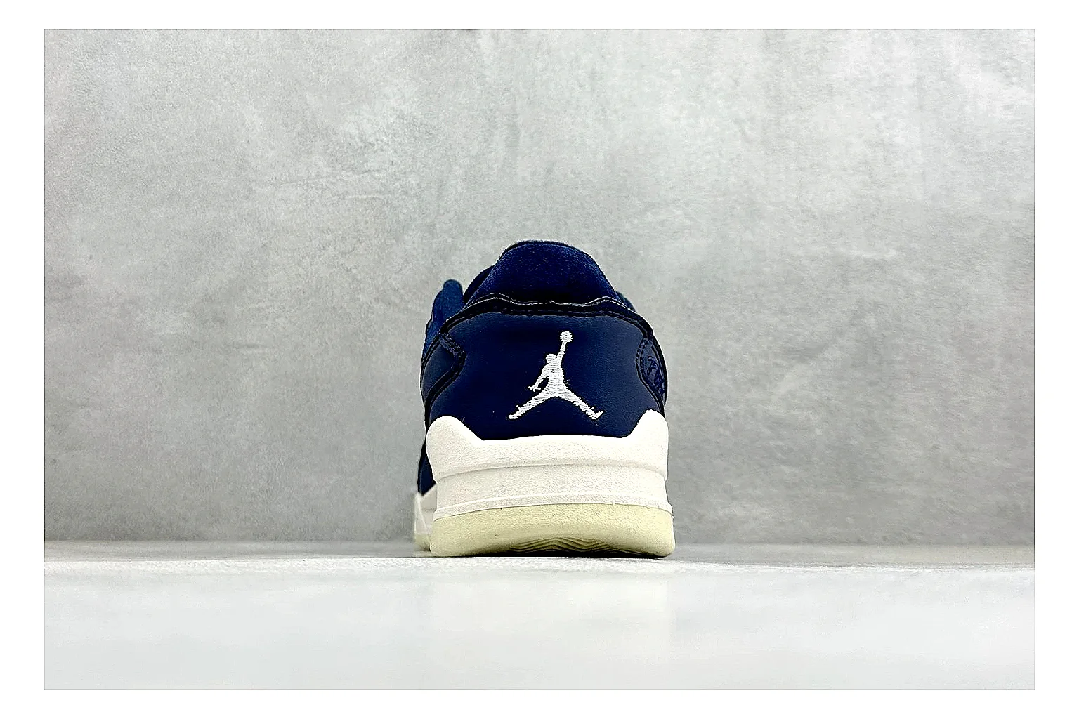 Jordan Flight Navy Suede comparison photo showing navy suede upper, low court silhouette, cream sole, and soft retro basketball profile thumbnail 3