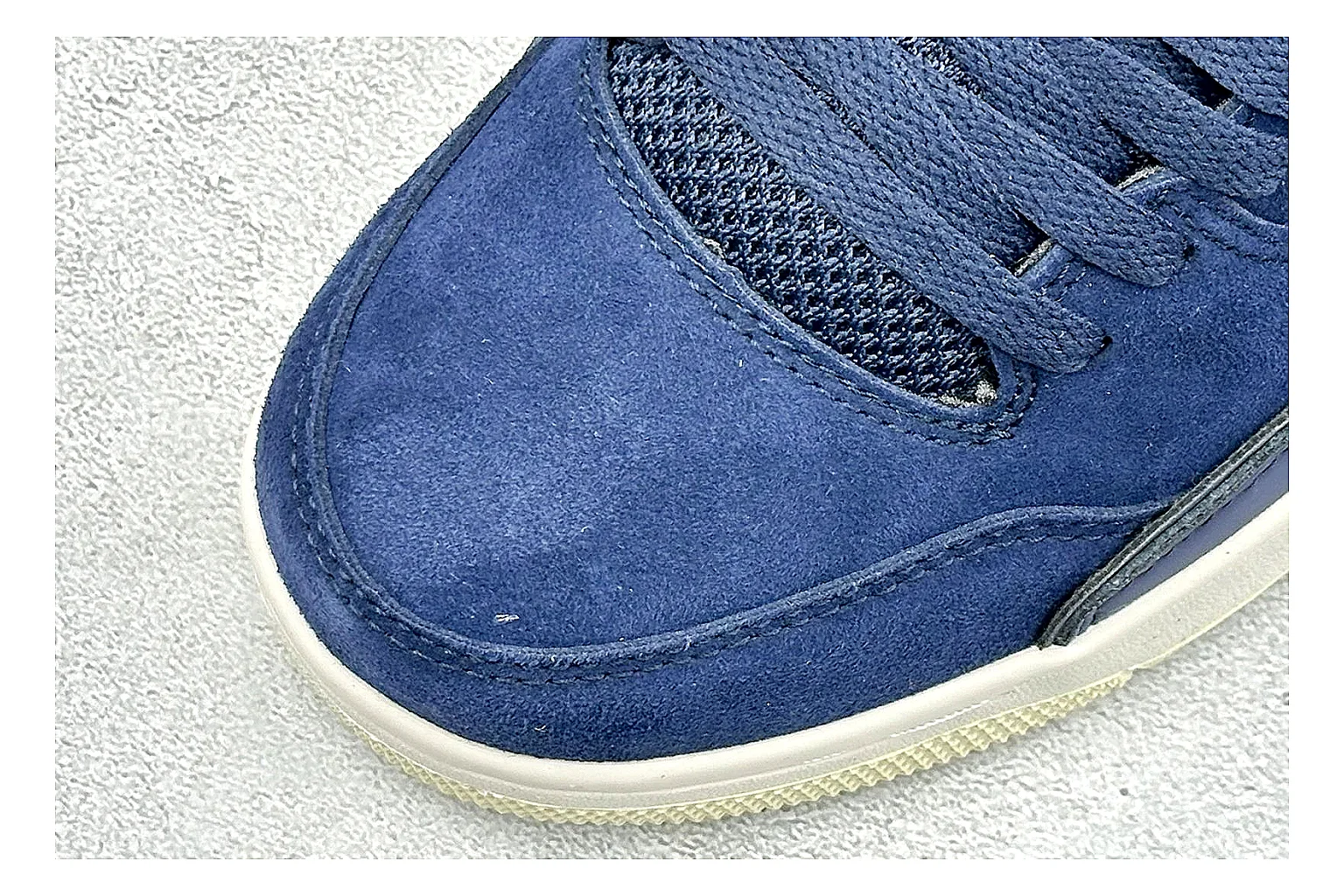 Jordan Flight Navy Suede comparison photo showing navy suede upper, low court silhouette, cream sole, and soft retro basketball profile thumbnail 5