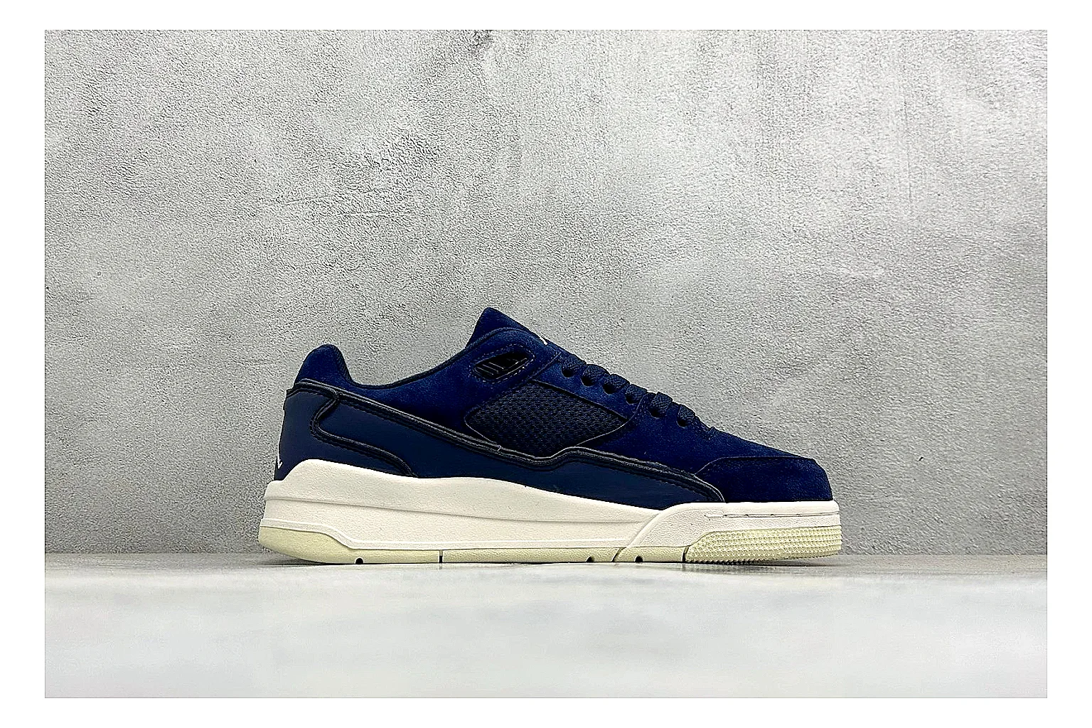 Jordan Flight Navy Suede comparison photo showing navy suede upper, low court silhouette, cream sole, and soft retro basketball profile thumbnail 6