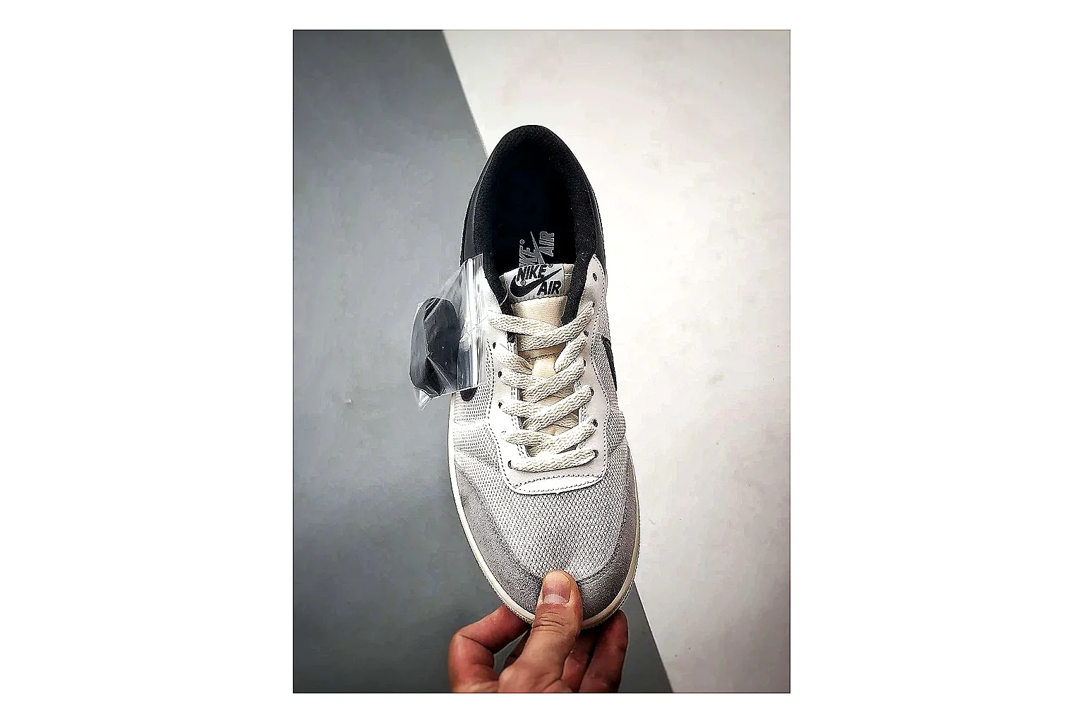 Jordan Low Black White Sneaker comparison signal photo with white black low-top sneaker with mixed-material upper and low-profile shape thumbnail 2