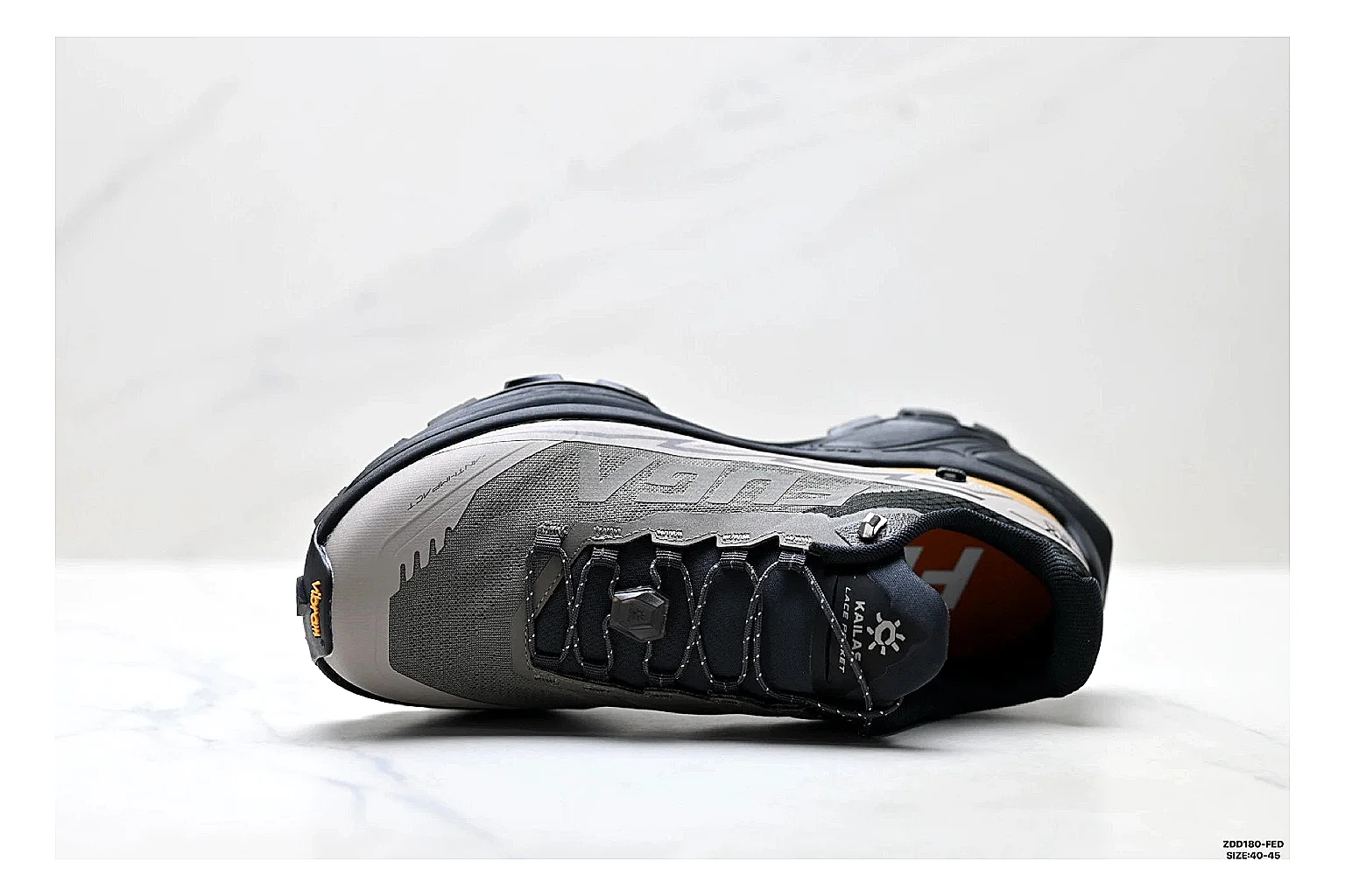 Kailas Fuga Gray Gold Sneakers comparison signal photo with gray gold outdoor running shoes with mesh texture, side-profile shape, upper panel lines, and outsole detail