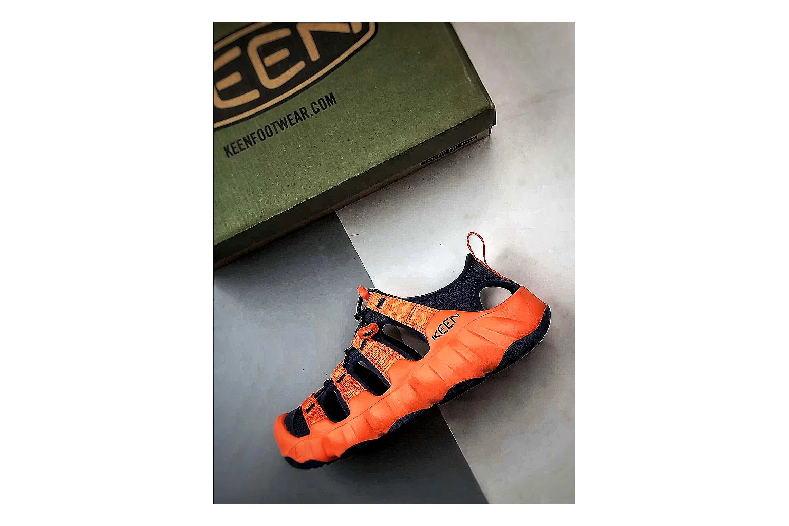 KEEN Jasper Sandal Orange Black comparison photo showing orange black suede-mesh upper, protective sandal structure, outdoor toe coverage, and rugged sole