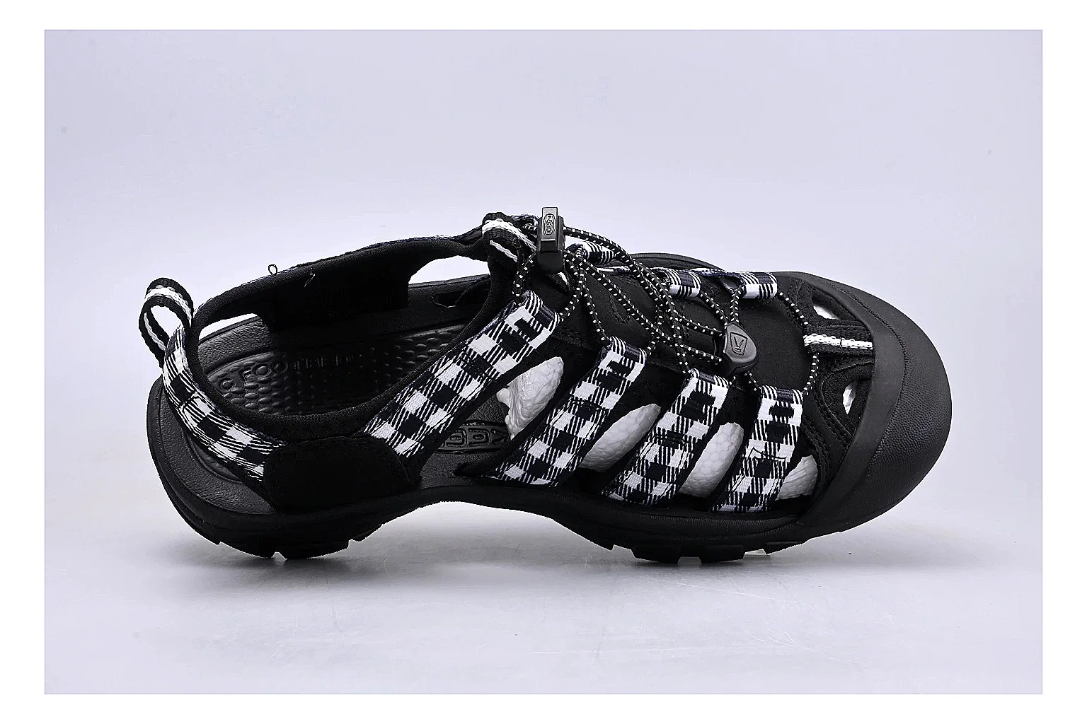 KEEN Zerraport Plaid Sandal comparison signal photo with white black plaid zerraport outdoor sandal with mixed upper and sandal shape thumbnail 2